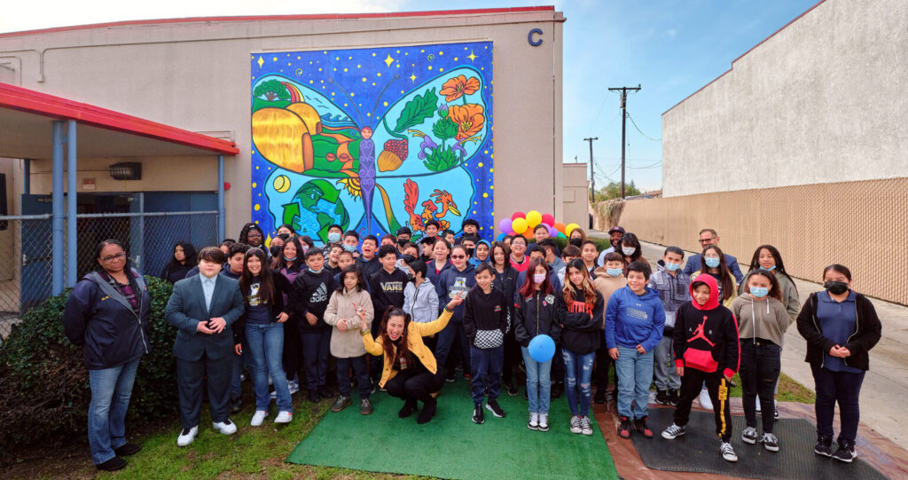 Group photo for the mural unveiling